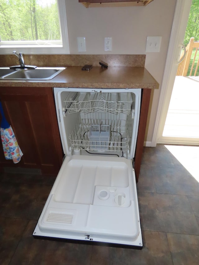 47375 Gone Golfin, Garrison, MN 56450 - kitchen featuring a sink and dishwasher