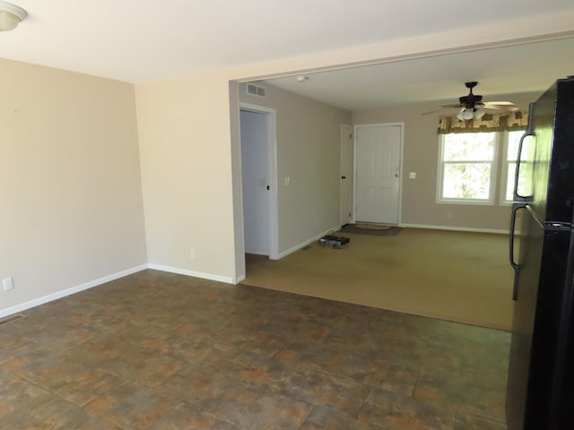 47375 Gone Golfin, Garrison, MN 56450 - unfurnished living room featuring a ceiling fan and baseboards