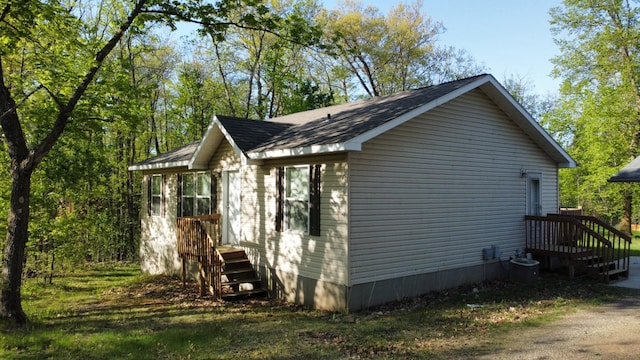 47375 Gone Golfin, Garrison, MN 56450 - view of side of property with a shingled roof