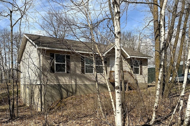 47375 Gone Golfin, Garrison, MN 56450 - view of home's exterior with a shingled roof