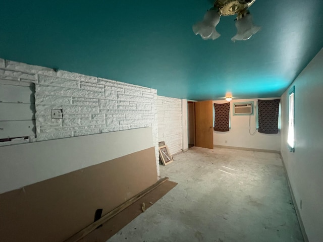 spare room featuring a wall mounted AC