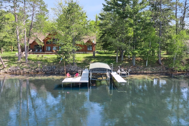 41849 Birchwood Dr, Emily, MN 56447 - dock with boat lift, a water view, and a lawn