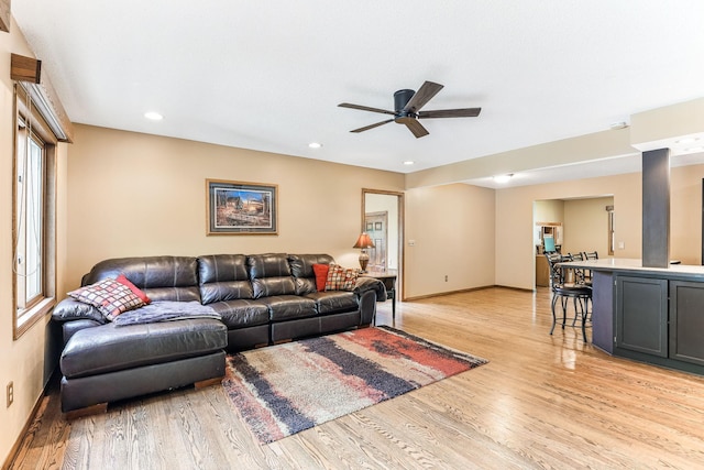 14308 Park Ave, Burnsville, MN 55337 - living room with light wood-style flooring, ceiling fan, baseboards, and recessed lighting