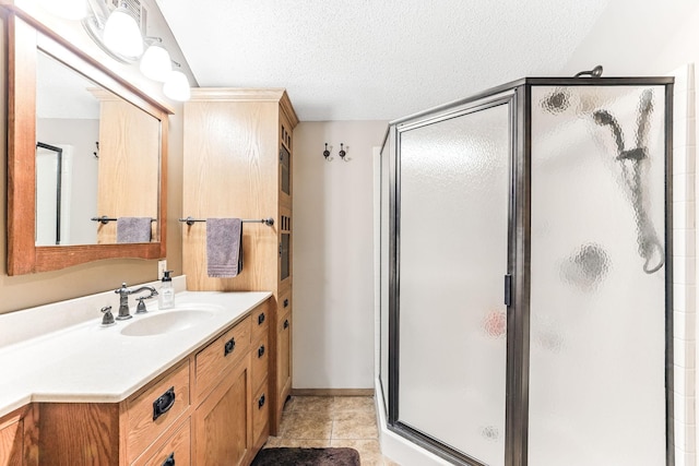 14308 Park Ave, Burnsville, MN 55337 - full bath with a stall shower, a textured ceiling, and vanity