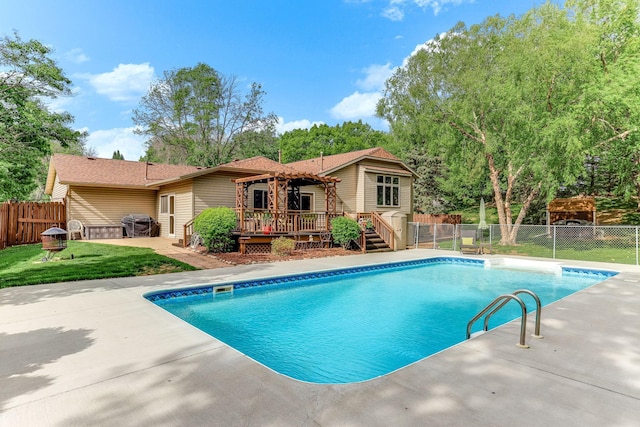 14308 Park Ave, Burnsville, MN 55337 - view of pool with a wooden deck, a pergola, and a patio
