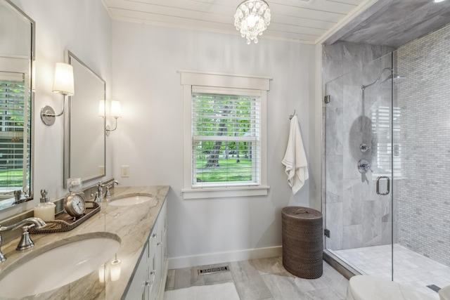 6024 Ojibwa Rd, Brainerd, MN 56401 - bathroom featuring a shower stall, double vanity, baseboards, a chandelier, and wood ceiling