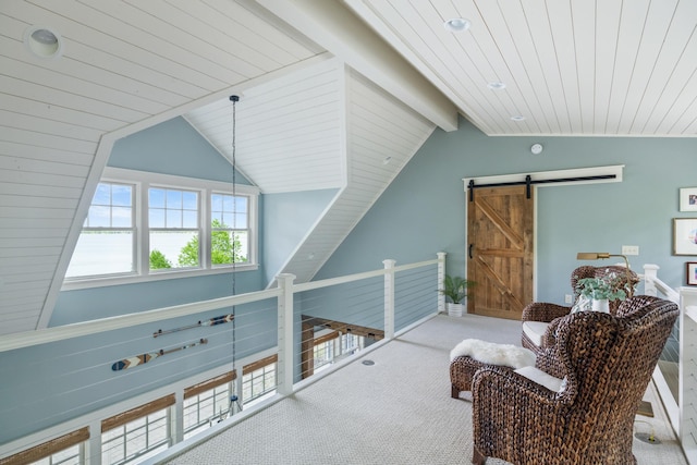 6024 Ojibwa Rd, Brainerd, MN 56401 - living area featuring vaulted ceiling, wood ceiling, carpet, and a barn door