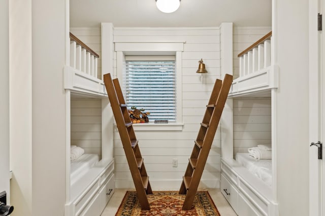 6024 Ojibwa Rd, Brainerd, MN 56401 - staircase featuring wood walls