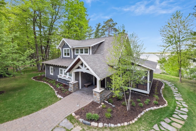 6024 Ojibwa Rd, Brainerd, MN 56401 - view of front facade with roof with shingles and a front yard