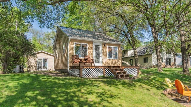 13749 169th Ave, Villard, MN 56385 - back of house featuring a yard and a deck