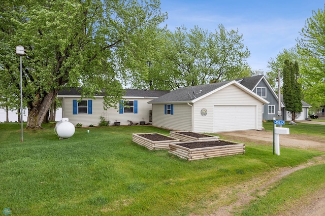 45642 Devils Lake Rd, Edna Twp, MN 56573 - view of front facade with an attached garage, a front yard, driveway, and a shingled roof