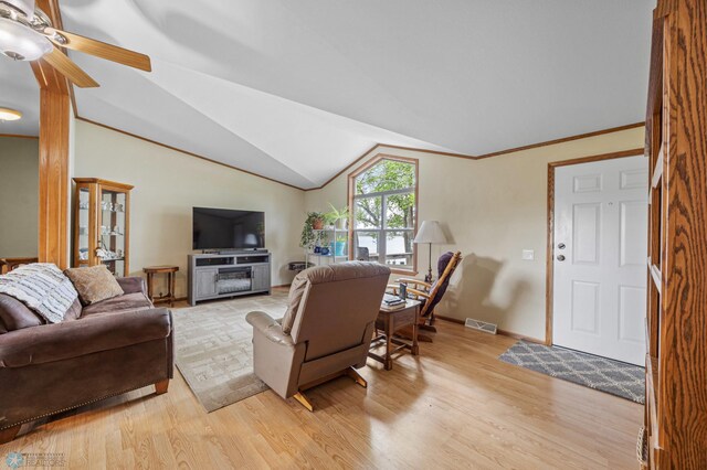 45642 Devils Lake Rd, Edna Twp, MN 56573 - living area featuring light wood-style flooring, a ceiling fan, baseboards, and lofted ceiling