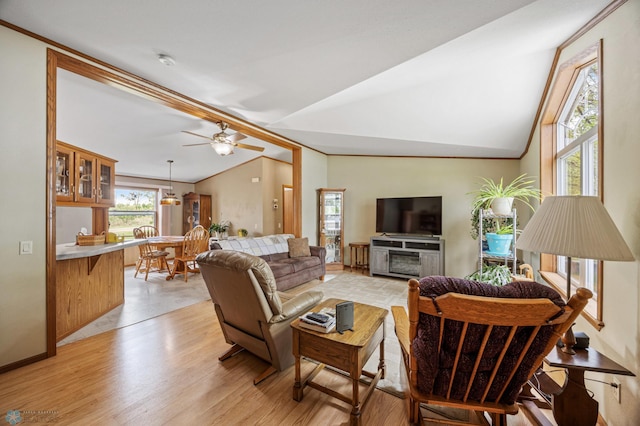 45642 Devils Lake Rd, Edna Twp, MN 56573 - living area featuring vaulted ceiling, ceiling fan, and light wood finished floors