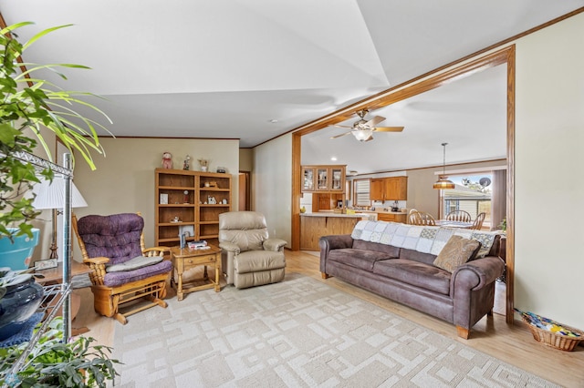 45642 Devils Lake Rd, Edna Twp, MN 56573 - living area with light wood-type flooring, a ceiling fan, and lofted ceiling