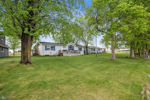 45642 Devils Lake Rd, Edna Twp, MN 56573 - view of grassy yard featuring a wooden deck