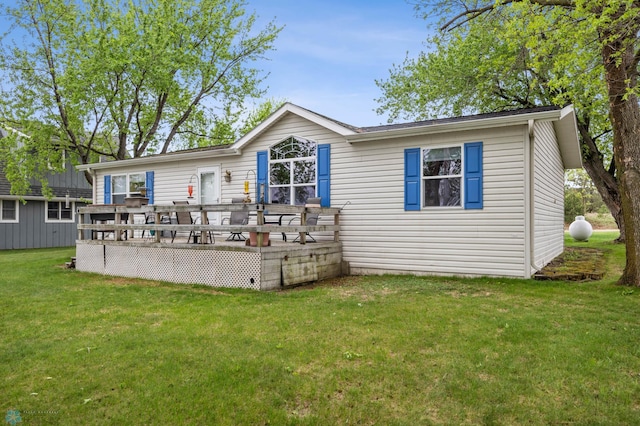 45642 Devils Lake Rd, Edna Twp, MN 56573 - view of front of home with a deck and a front lawn