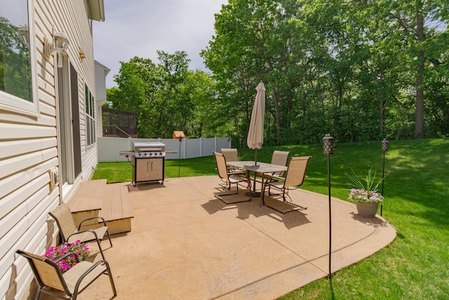 4132 Oakbrooke Curv, Eagan, MN 55122 - view of patio featuring a grill and outdoor dining space