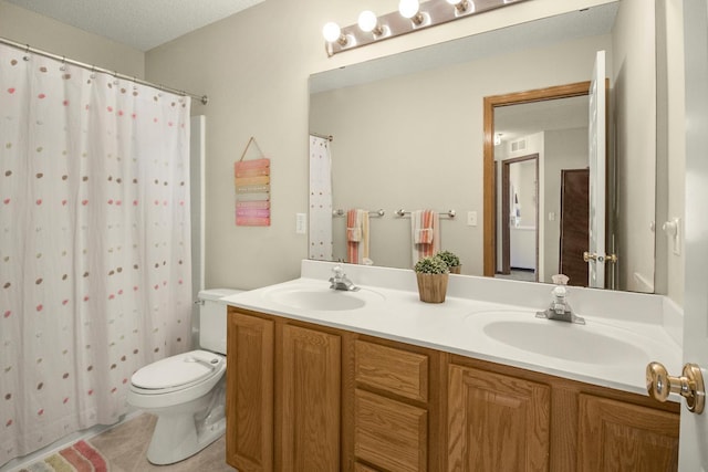 4132 Oakbrooke Curv, Eagan, MN 55122 - bathroom featuring double vanity, toilet, tile patterned flooring, and a shower with shower curtain