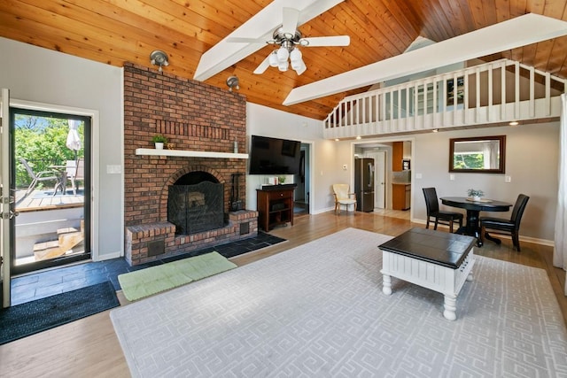 1460 36th St, Minneapolis, MN 55408 - living room with wood finished floors, wooden ceiling, a ceiling fan, and baseboards