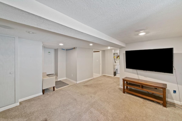 1460 36th St, Minneapolis, MN 55408 - carpeted living room featuring baseboards, a textured ceiling, and recessed lighting