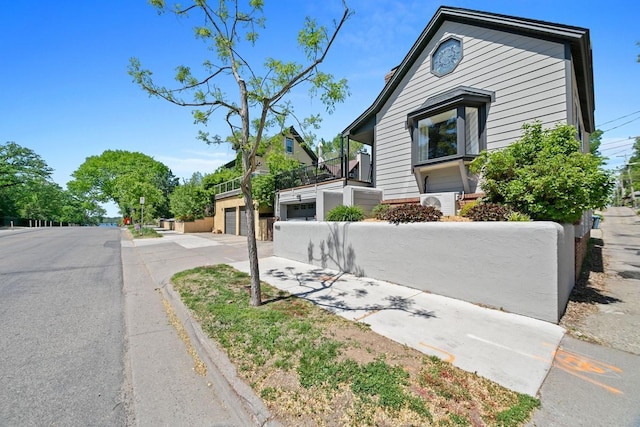 1460 36th St, Minneapolis, MN 55408 - view of front of property with a garage and driveway