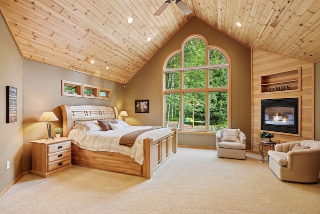 40335 Government Rd, Barry Twp, MN 55037 - carpeted bedroom with high vaulted ceiling, wood ceiling, and a fireplace