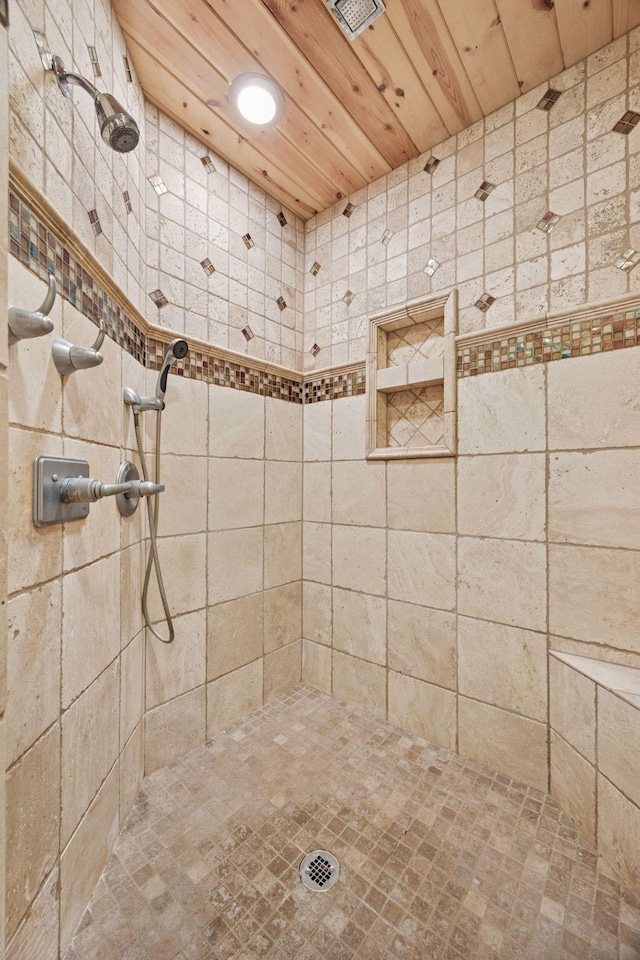 40335 Government Rd, Barry Twp, MN 55037 - full bath featuring tiled shower and wooden ceiling