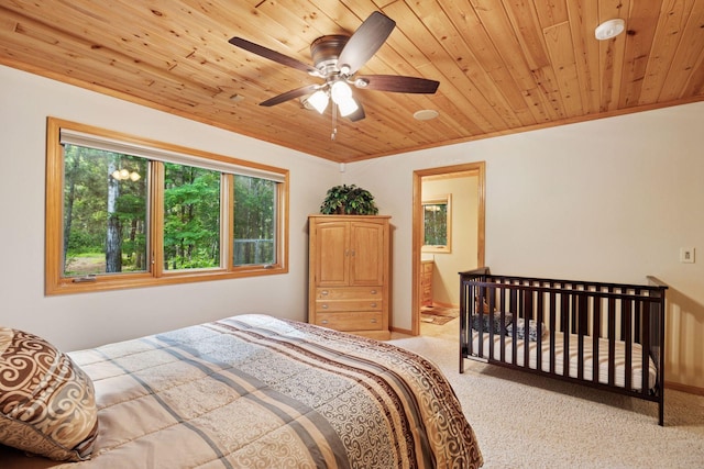 40335 Government Rd, Barry Twp, MN 55037 - bedroom with wooden ceiling, carpet flooring, and ceiling fan