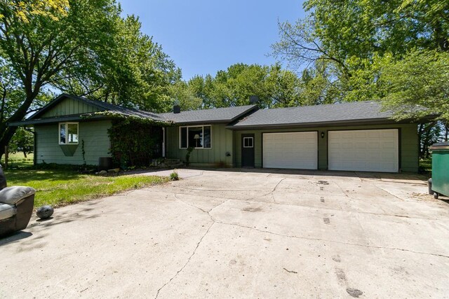 11197 608th Ave, Danville Twp, MN 56068 - single story home with a garage, board and batten siding, and driveway