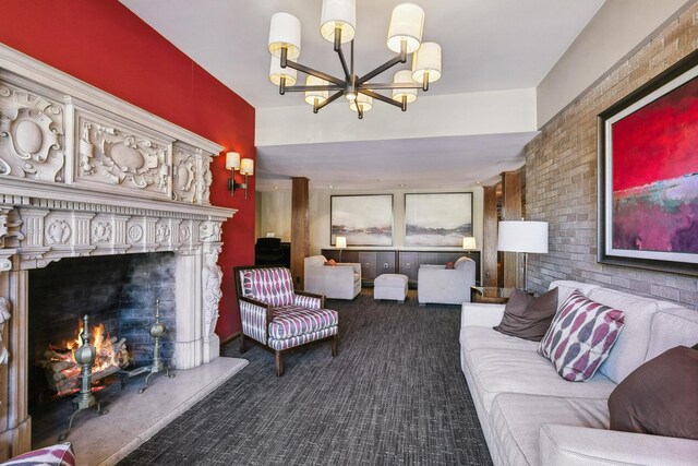 400 Groveland Ave Unit 1512, Minneapolis, MN 55403 - living room featuring carpet floors, a chandelier, and a warm lit fireplace