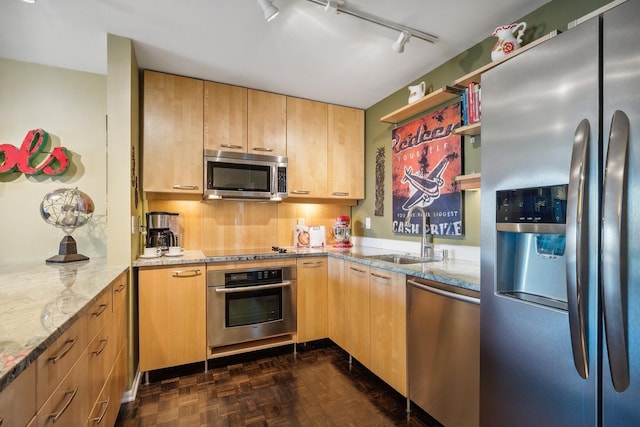 400 Groveland Ave Unit 1512, Minneapolis, MN 55403 - kitchen featuring stainless steel appliances, track lighting, a sink, light stone countertops, and light brown cabinets