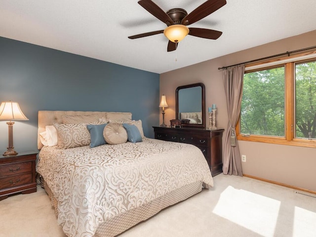 5705 Quinwood Ln N, Plymouth, MN 55442 - carpeted bedroom with ceiling fan and baseboards