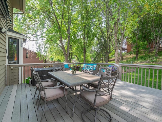 5705 Quinwood Ln N, Plymouth, MN 55442 - wooden terrace with outdoor dining space