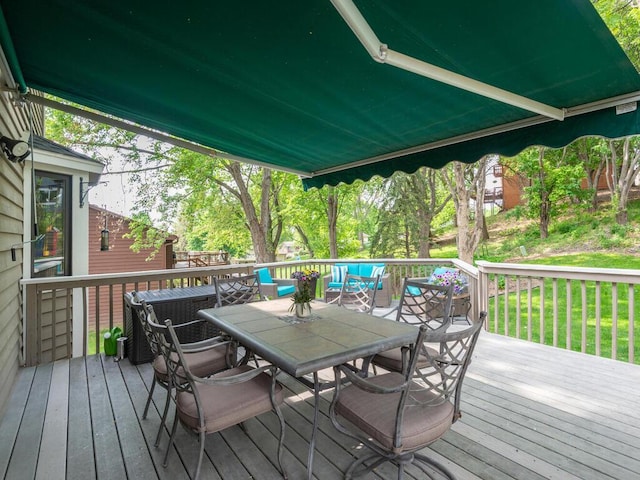5705 Quinwood Ln N, Plymouth, MN 55442 - wooden deck featuring outdoor dining area