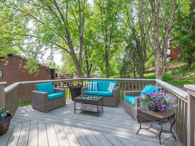 5705 Quinwood Ln N, Plymouth, MN 55442 - wooden deck with an outdoor hangout area