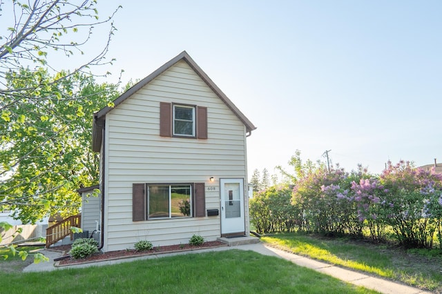 608 7th Ave S, Hopkins, MN 55343 - rear view of property with a yard