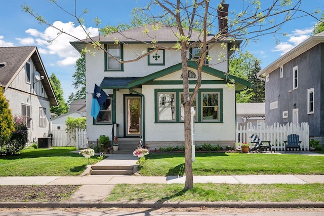 2723 Garfield St NE, Minneapolis, MN 55418 - view of front of property featuring stucco siding, a chimney, and central AC