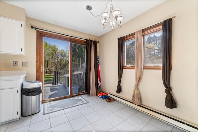 doorway to outside with a baseboard radiator, a chandelier, and light tile patterned floors