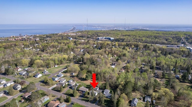 aerial view of property's location featuring a nearby body of water