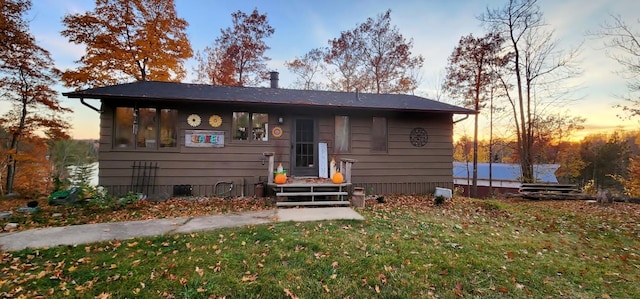 30091 Sunny Beach Rd, Harris Twp, MN 55744 - view of front of home with a lawn