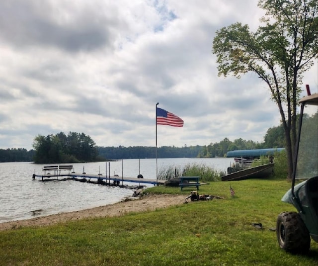 30091 Sunny Beach Rd, Harris Twp, MN 55744 - dock featuring a water view and a yard