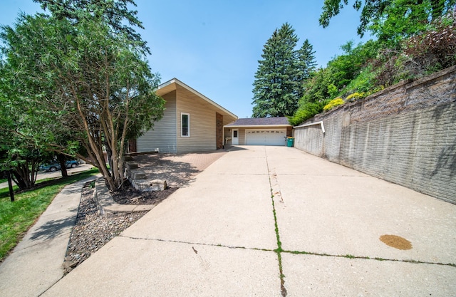 1723 Teton Ln NE, Rochester, MN 55906 - view of side of property with a garage