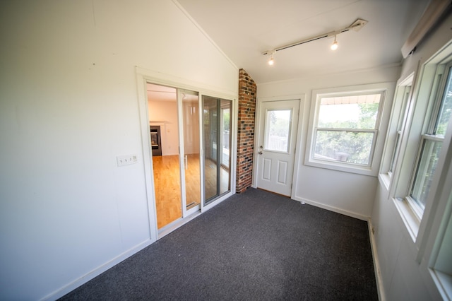 1723 Teton Ln NE, Rochester, MN 55906 - unfurnished sunroom featuring vaulted ceiling and rail lighting