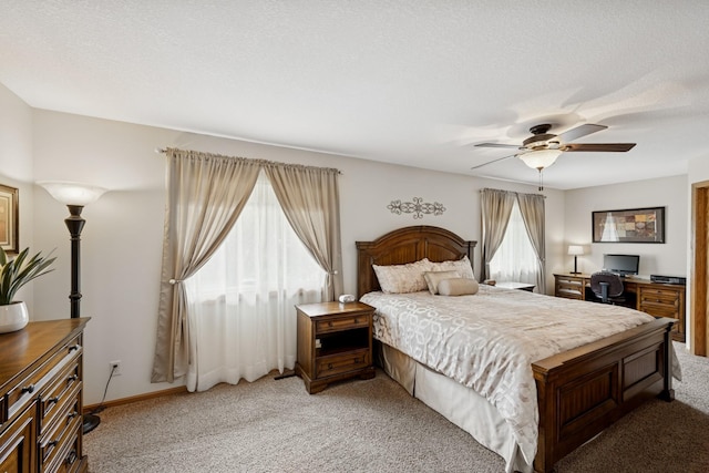 1301 Crestridge Ln, Eagan, MN 55123 - bedroom with light carpet, a ceiling fan, a textured ceiling, and baseboards