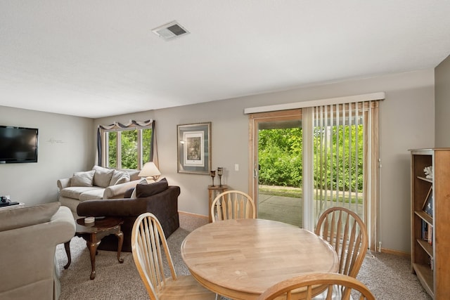 1301 Crestridge Ln, Eagan, MN 55123 - dining space featuring light carpet and baseboards