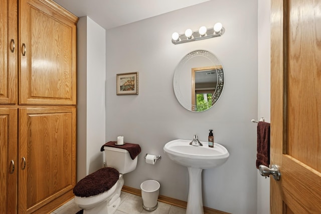 1301 Crestridge Ln, Eagan, MN 55123 - half bath with toilet, tile patterned floors, and baseboards