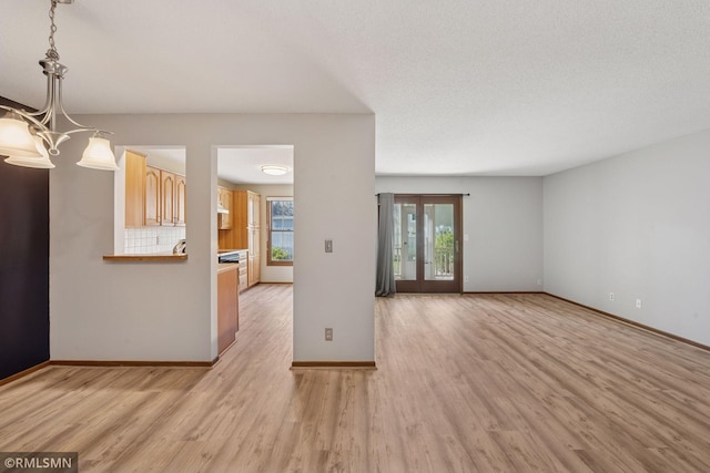 7475 110th St W, Bloomington, MN 55438 - unfurnished room with light wood-style floors and baseboards