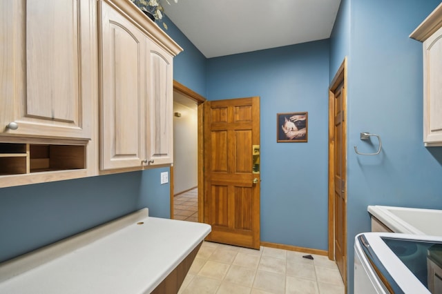 342 Soo Line Rd, Troy Twp, WI 54016 - laundry area with cabinet space and light tile patterned floors