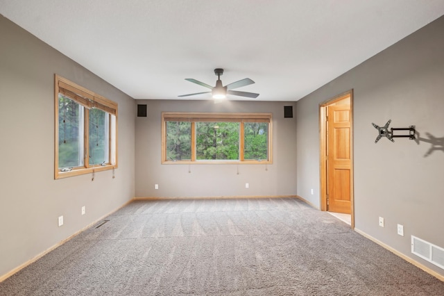 342 Soo Line Rd, Troy Twp, WI 54016 - unfurnished room with a ceiling fan, carpet floors, and baseboards