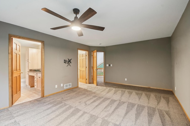 342 Soo Line Rd, Troy Twp, WI 54016 - carpeted empty room with a ceiling fan and baseboards